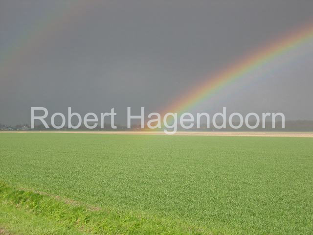 landschap met regenboog